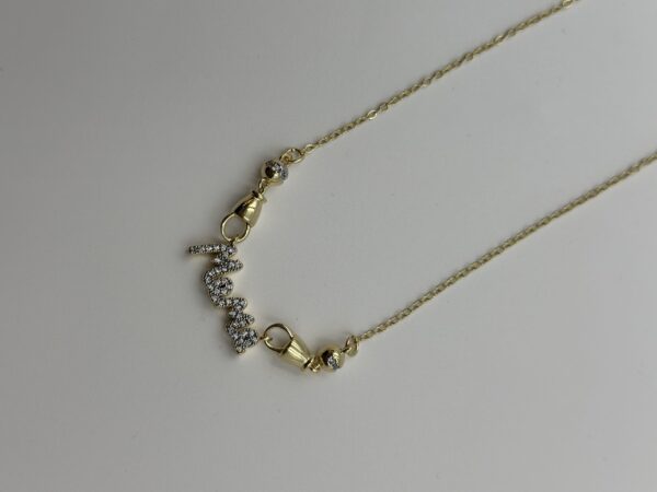 YAZI FİGÜRLÜ GOLD ÇELİK KOLYE